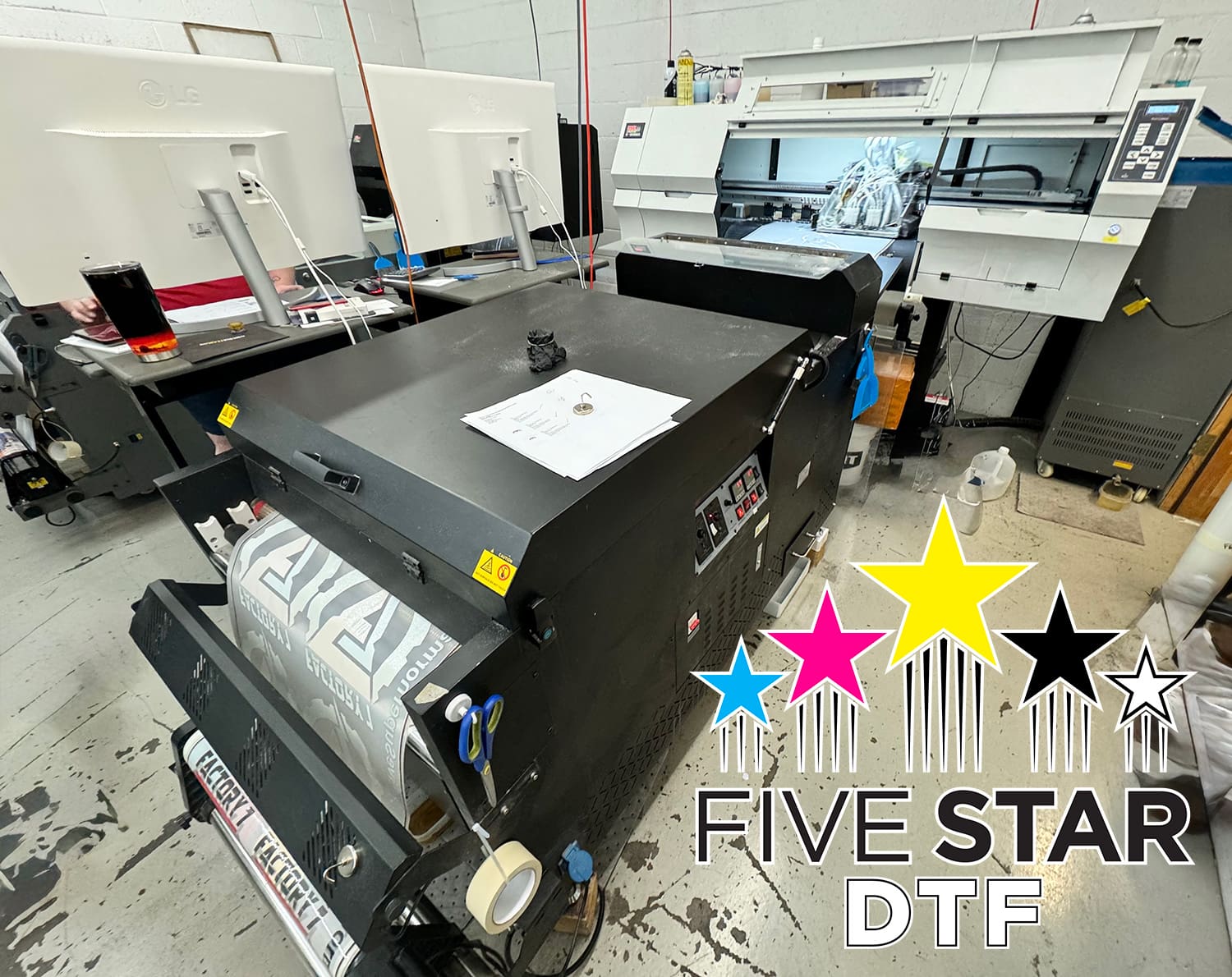 five-star-dtf-printing-arizona-print-shop DTF printer producing custom transfers at Five Star DTF’s Arizona print shop.